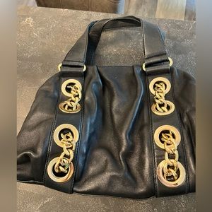 Michael Kors Black with gold accents shoulder bag